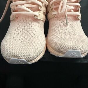 Adidas Women’s ultra boost light peach color.